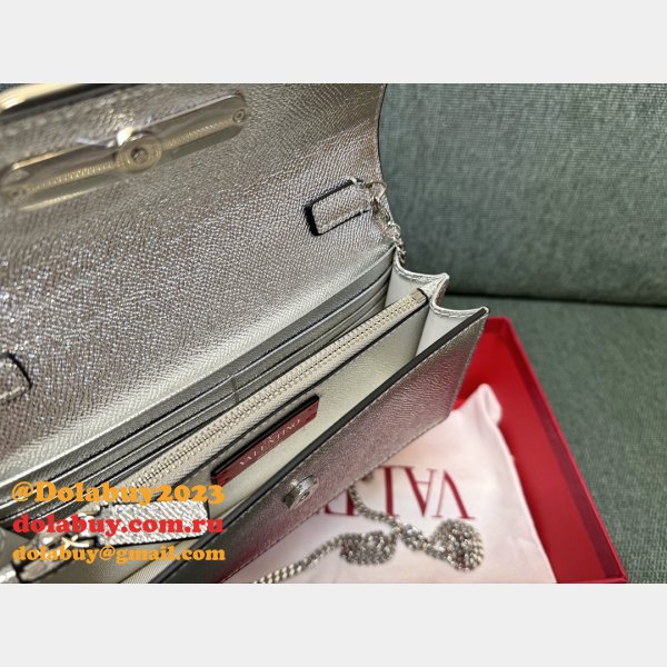 Valentino Garavani V Logo Signature Grained Calfskin Clutch